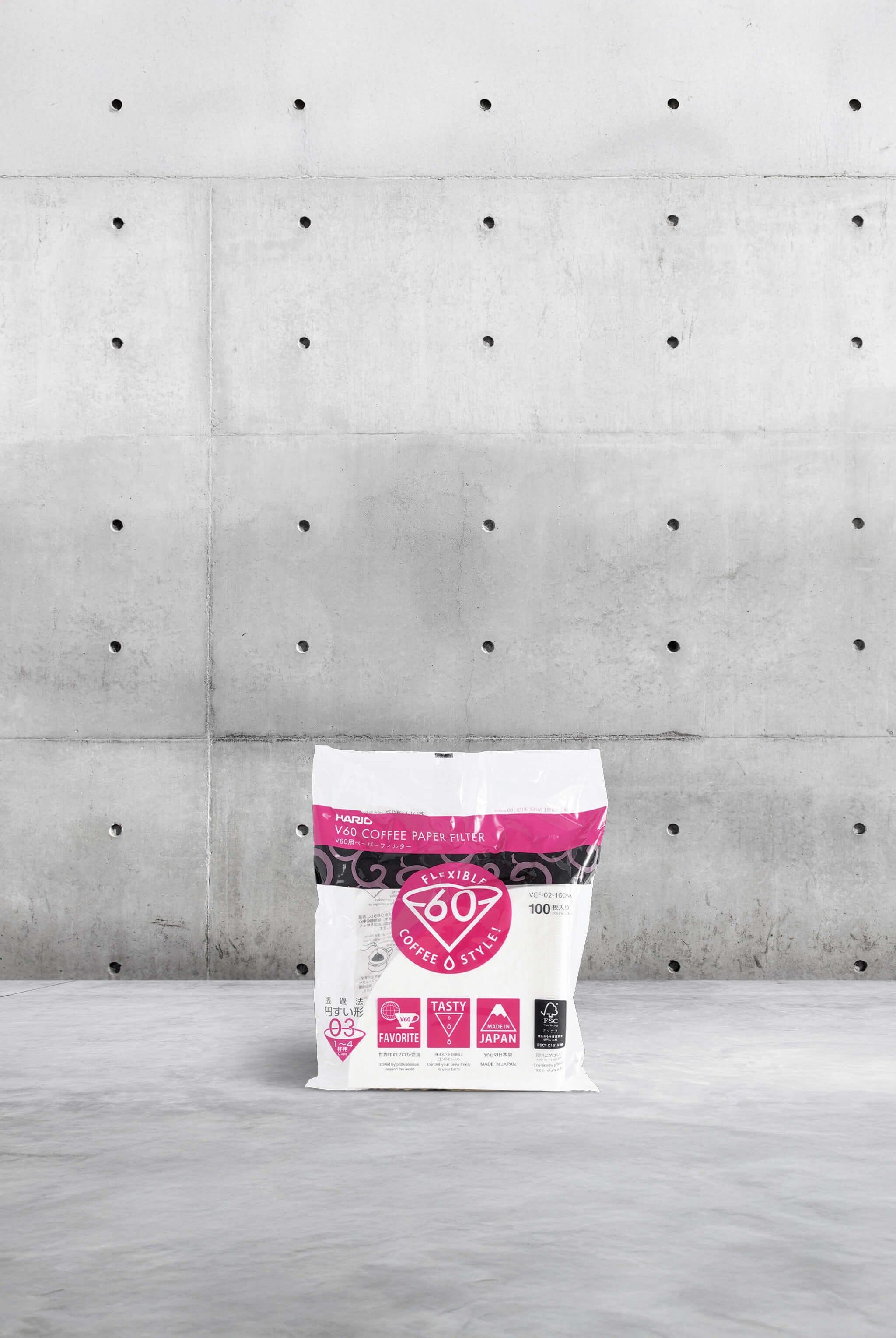 Hario 03 paper coffee filters on grey background