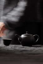 Teapot and Cup on table