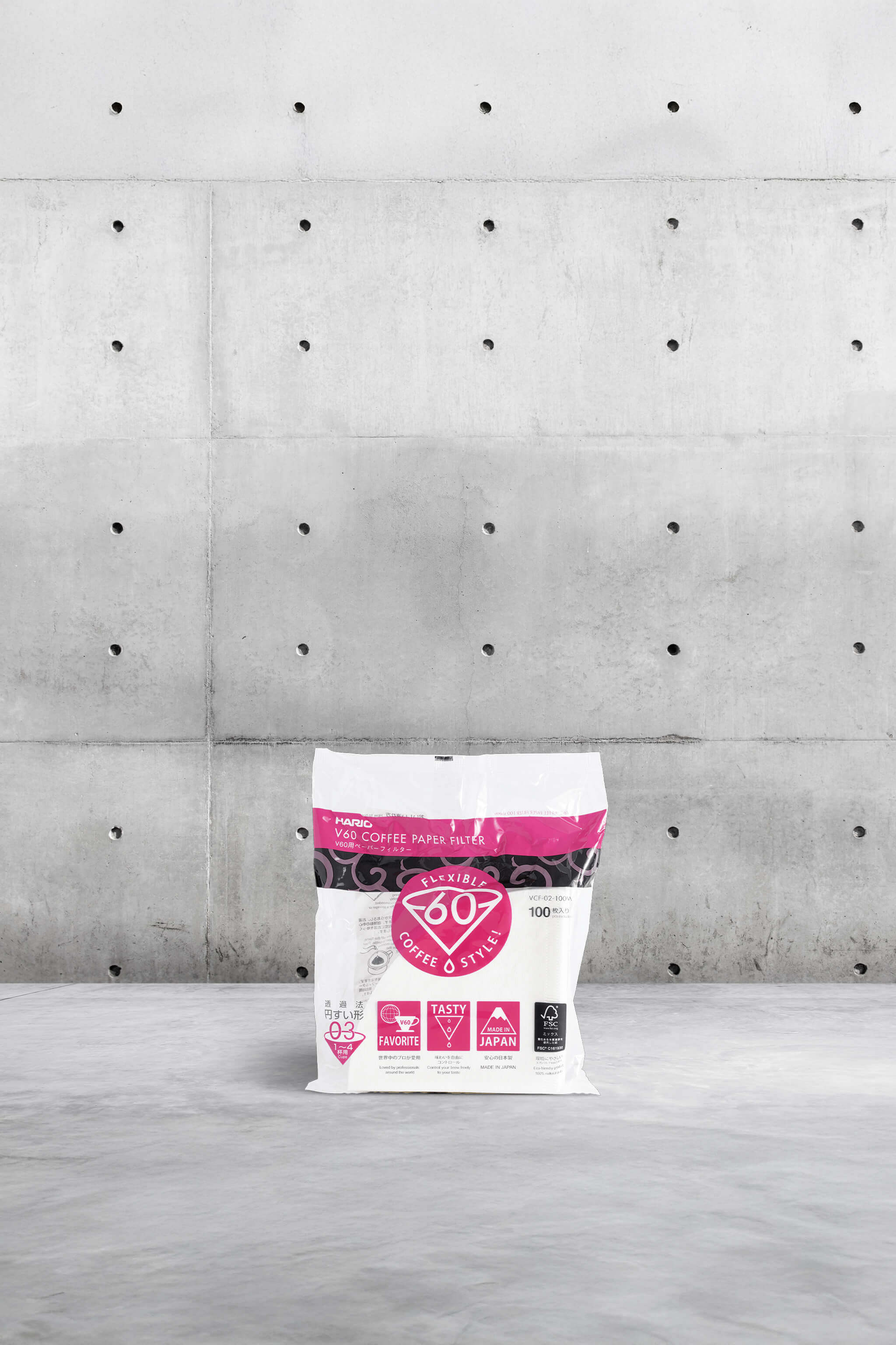 Hario 03 paper coffee filters on grey background